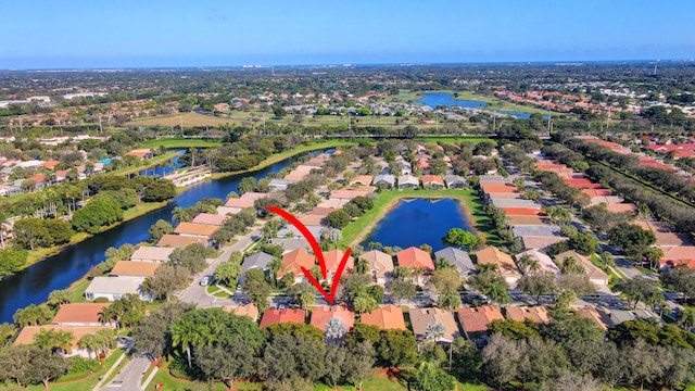 drone / aerial view featuring a water view