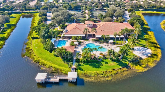 birds eye view of property featuring a water view