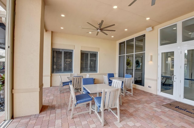 view of patio with ceiling fan and french doors