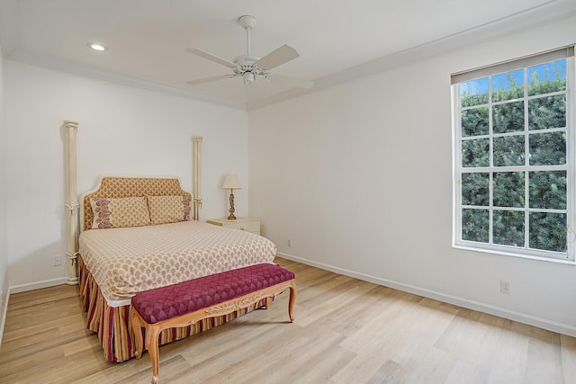 bedroom with baseboards, ceiling fan, crown molding, light wood-style floors, and recessed lighting