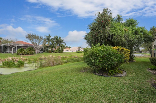 view of yard featuring a lanai