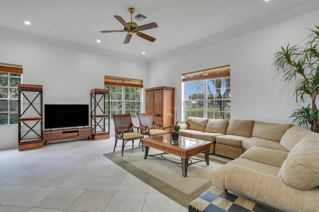 living area with recessed lighting, visible vents, and crown molding