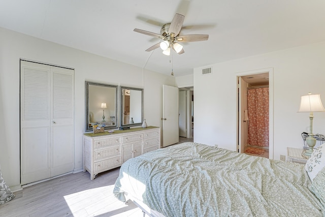 bedroom with light hardwood / wood-style floors and ceiling fan