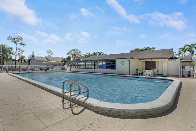 view of pool featuring a patio