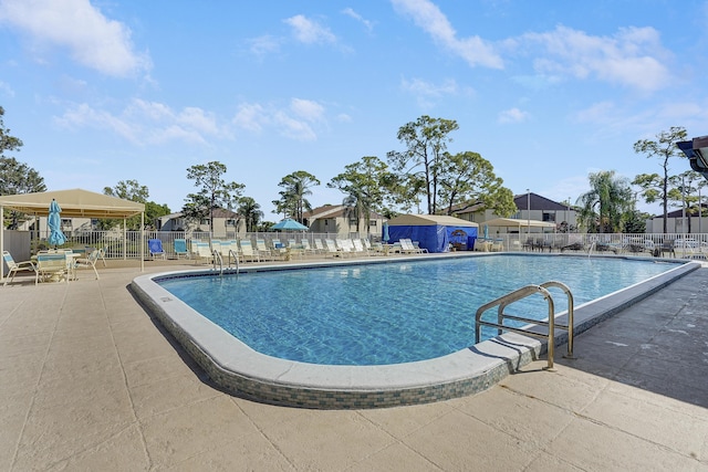 view of pool featuring a patio area