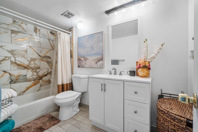 full bathroom featuring vanity, toilet, and shower / tub combo