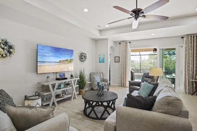 living room featuring ceiling fan