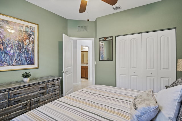 bedroom with ceiling fan and a closet