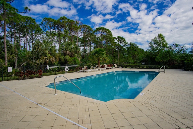 view of pool with a patio area