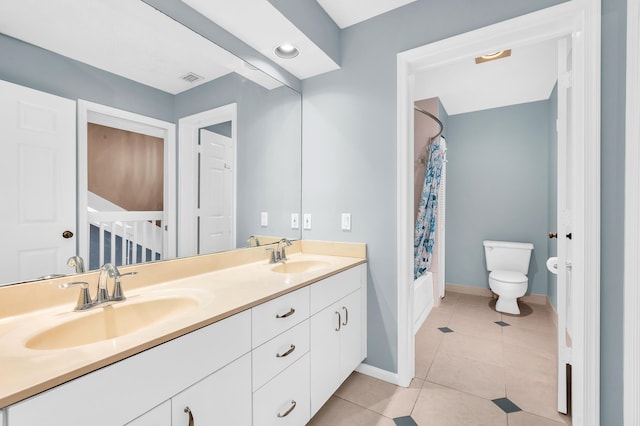 full bathroom featuring tile patterned flooring, vanity, shower / bath combination with curtain, and toilet