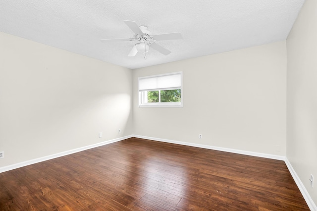 unfurnished room featuring ceiling fan, a textured ceiling, and dark hardwood / wood-style flooring