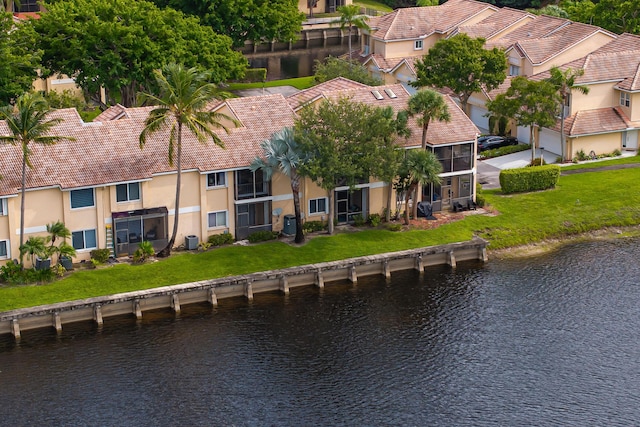 bird's eye view with a water view