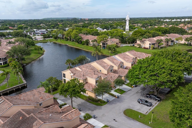 drone / aerial view with a water view