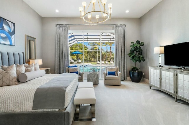 bedroom with carpet flooring and a chandelier