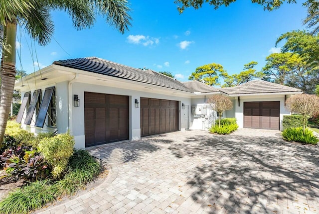 view of front of property with a garage