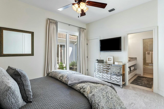 bedroom with connected bathroom, access to exterior, ceiling fan, and carpet flooring