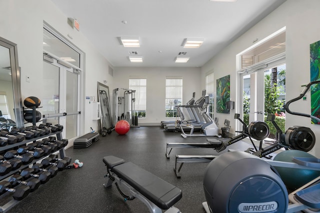 exercise room featuring french doors