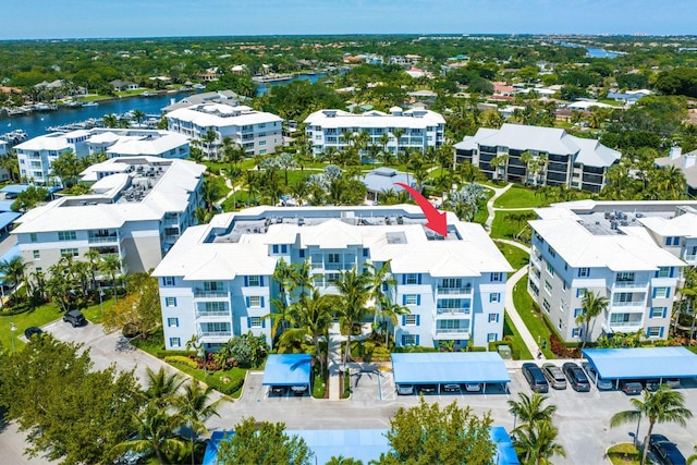 birds eye view of property featuring a water view