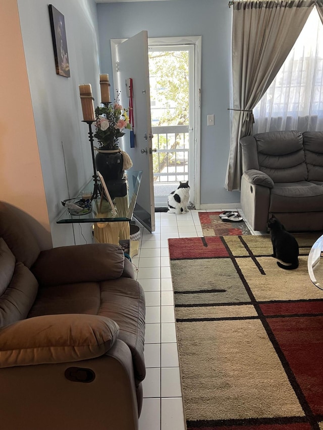 living room with tile patterned floors