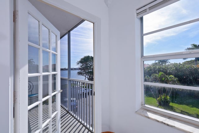 balcony featuring a water view