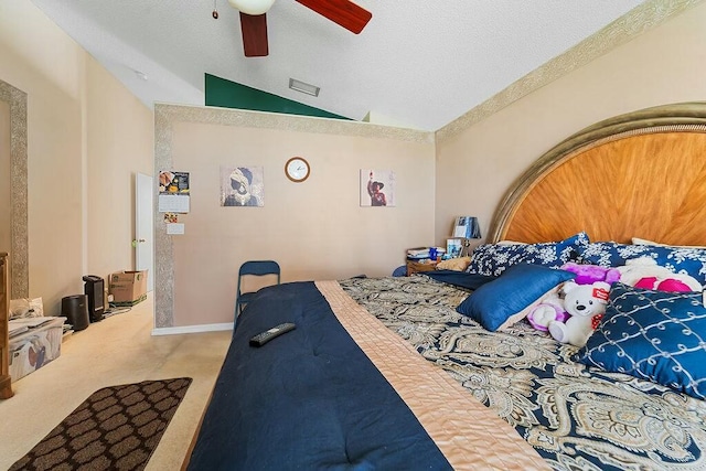 bedroom featuring lofted ceiling, a textured ceiling, ceiling fan, and carpet