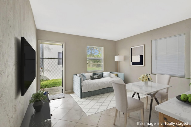 bedroom featuring light tile patterned floors