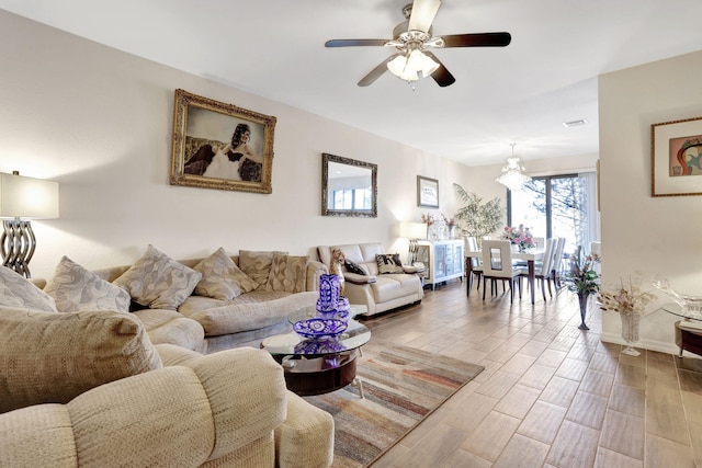 living room featuring ceiling fan