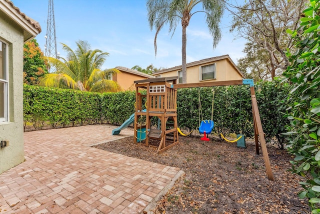 view of play area with a patio area