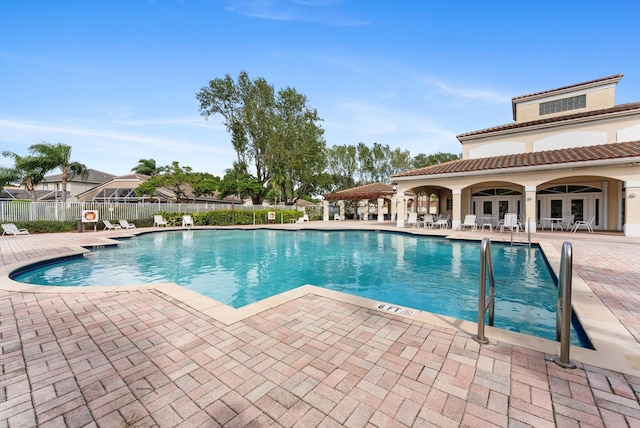 view of swimming pool featuring a patio