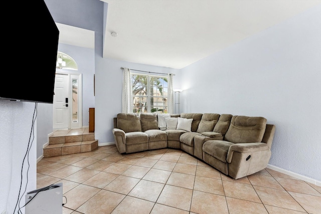 living room with light tile patterned flooring