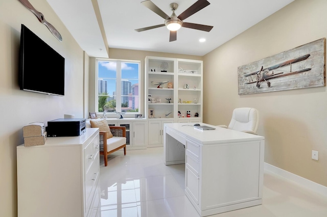 tiled home office with ceiling fan