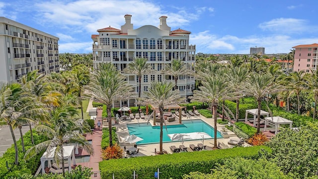 view of swimming pool featuring a gazebo and a patio area