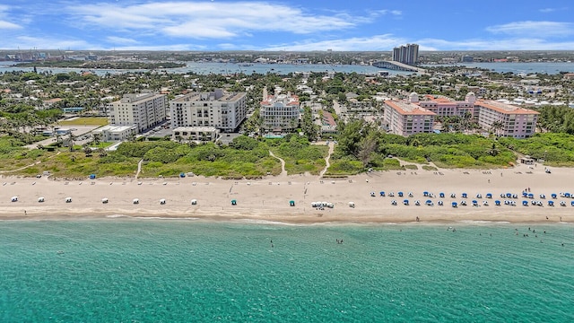 aerial view featuring a water view and a view of the beach