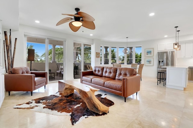 living room with ceiling fan