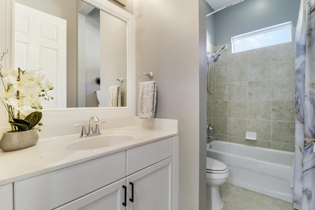 bathroom with vanity, toilet, tile patterned flooring, and shower / tub combo with curtain