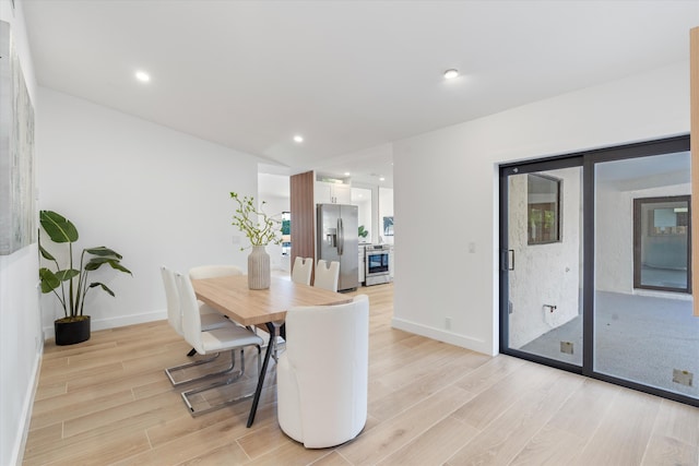 dining area featuring light hardwood / wood-style flooring