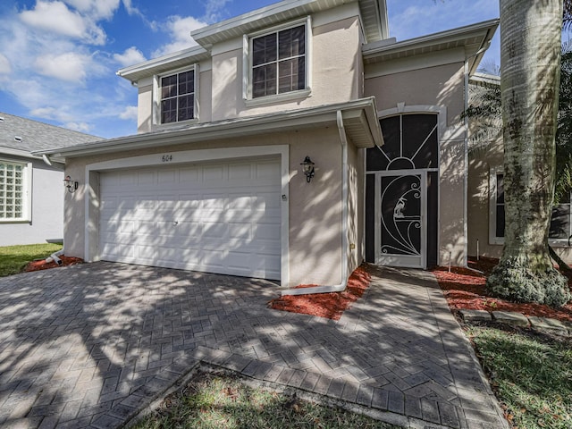 view of front of house with a garage