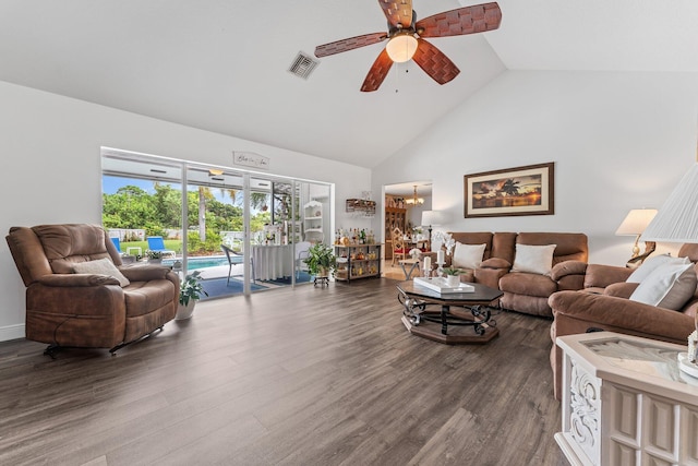 living room featuring dark wood-type flooring, high vaulted ceiling, and ceiling fan