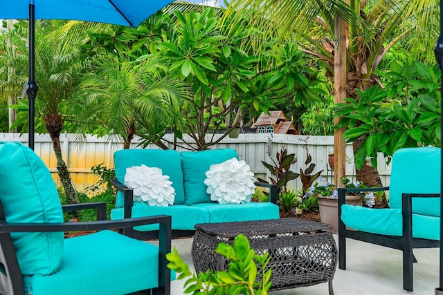 balcony with a patio area and outdoor lounge area