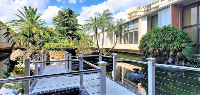 view of dock with a balcony