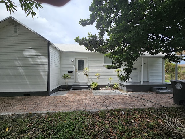 rear view of house featuring a patio area