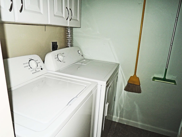 laundry area featuring cabinets and washer and dryer