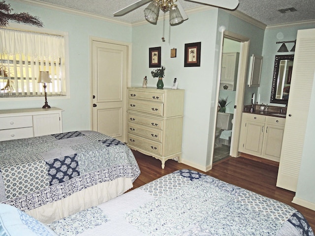 bedroom featuring crown molding, dark hardwood / wood-style floors, and a textured ceiling