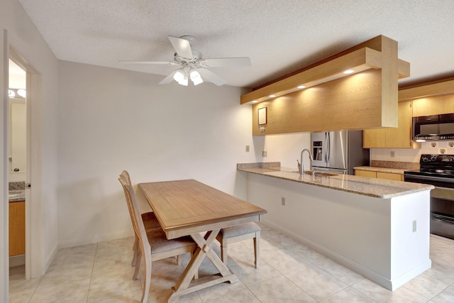 kitchen with stainless steel refrigerator with ice dispenser, black electric range, light stone countertops, kitchen peninsula, and light brown cabinets