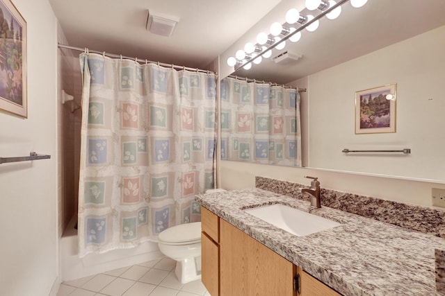 full bathroom with vanity, toilet, tile patterned flooring, and shower / bath combo with shower curtain