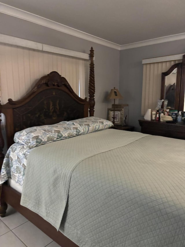 tiled bedroom with crown molding