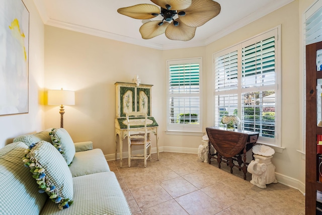 living area with crown molding, light tile patterned floors, and ceiling fan