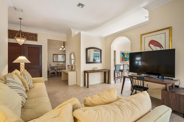 living room featuring ornamental molding, a chandelier, and light tile patterned flooring