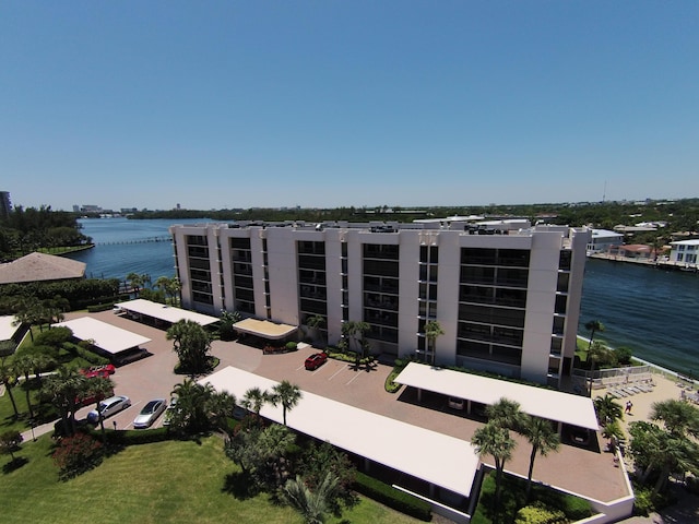 birds eye view of property featuring a water view