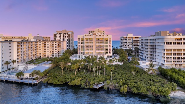 outdoor building at dusk with a water view